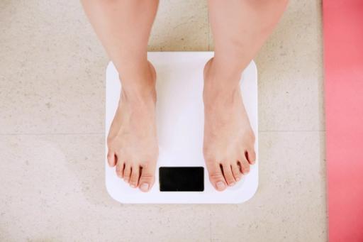 woman on weight machine - How Are Calories Measured